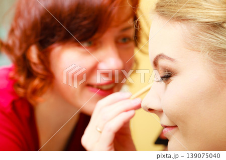 Close up woman getting make up, eyes 139075040
