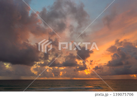 Aerial view of Vibrant Sunset Over Tranquil Beach 139075706