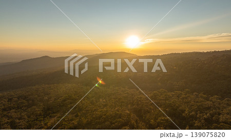 A Serene Morning Scene of Sunlight Distant Mountain Peaks A Serene Morning Scene of Sunlight Distant Mountain Peaks 139075820