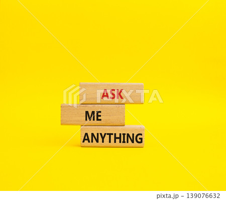 Question symbol. Concept words Ask me Anything on wooden blocks. Beautiful yellow background. Business and Ask me Anything concept. Copy space 139076632