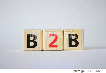 B2B, business to business marketing symbol. Concept word B2B on wooden blocks. Beautiful white background. Business and B2B concept. Copy space 139076659
