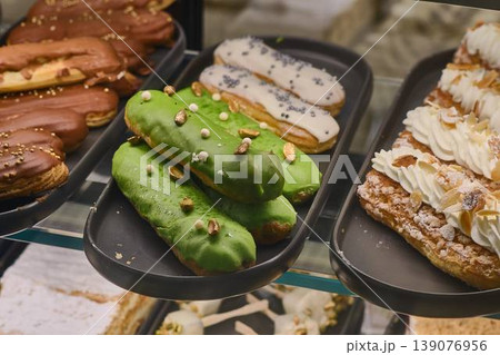 Variety of colorful cakes and sweet desserts Variety of colorful cakes and sweet desserts 139076956