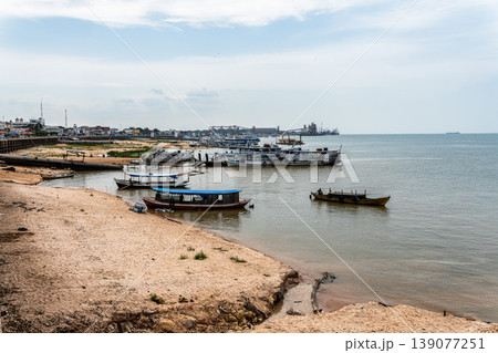 Boats docked at Santarem port along the banks of the Tapajos river in Santarem, Para State, Brazil. Boats docked at Santarem port along the banks of the Tapajos river in Santarem, Para State, Brazil. 139077251