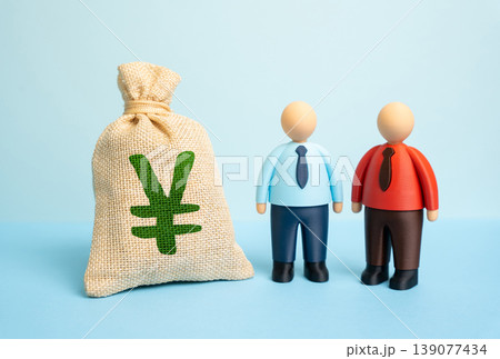 Two businessmen negotiate over japanese yen or chinese yuan money bag before signing a deal. Currency exchange and contract. Financial agreement reflects international trade 139077434