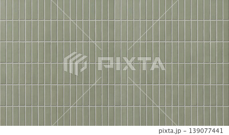 Minimalist green tile wall texture for architectural background. Minimalist green tile wall texture for architectural background. 139077441