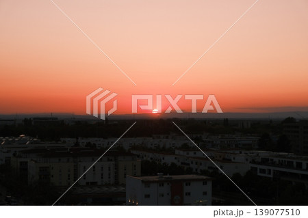 sunset over city sunset over city 139077510