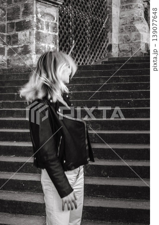 Black and White Blurred Portrait of Woman on Stone Stairs Black and White Blurred Portrait of Woman on Stone Stairs 139077648