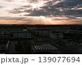 sunset with highly detailed aerial city view with crossroads 139077694