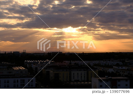 sunset over city sunset over city 139077696