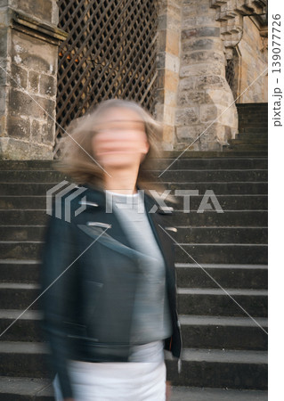 Abstract Blurred Portrait of Woman on Cathedral Steps 139077726