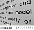 Close Up Fragment of Printed Text on White Wall 139078864