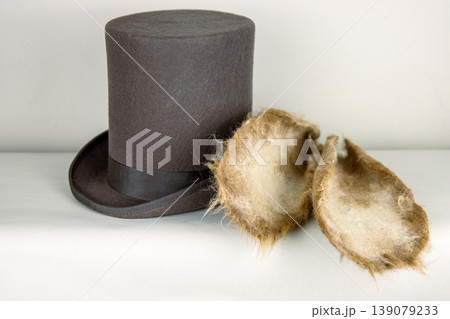 Felted  ears on a top hat.  White rabbit or march hare hat. Bunny ears attached to the top hat on wooden stand. Hatter Headdress for Alice in wonderland. 139079233