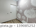 Modern Interior with White Flush Door and Dandelion Wallpaper 139085252