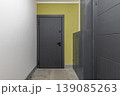 Modern Apartment Entrance with Dark Textured Security Door 139085263