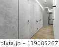 Modern Minimalist Hallway with Concealed Doors and Concrete Wall Texture 139085267