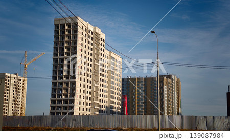 Construction of residential buildings in a city under clear blue sky Construction of residential buildings in a city under clear blue sky 139087984
