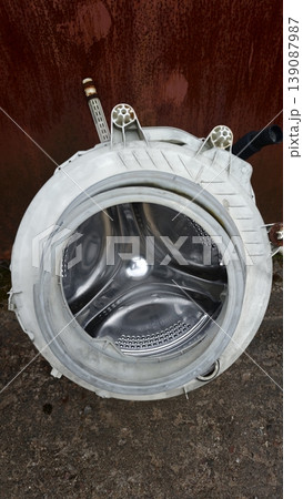 Inside view of a washing machine drum showing the inner structure clearly 139087987