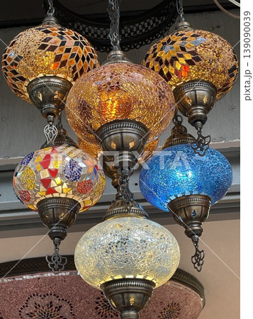 Colorful mosaic lamps hanging from ceiling, traditional Turkish decor Colorful mosaic lamps hanging from ceiling, traditional Turkish decor 139090039