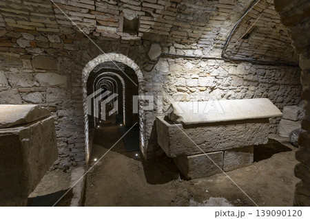 Ancient Roman crypt tunnel with sarcophagi in Ascoli Piceno, Italy 139090120