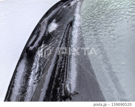 Frosted vehicle windshield amid winter storms and icy conditions 139090520