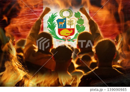 Concept of protests and social unrest in Peru. Silhouette of a crowd facing a burning flag of Peru with raised fists. Political conflict and revolution abstract image 139090985