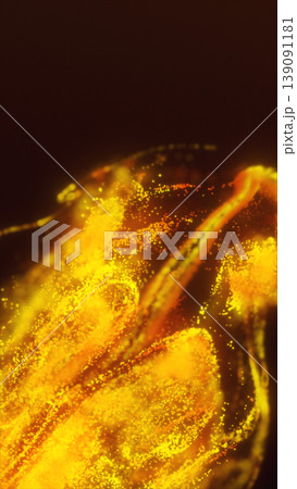 Close-up of glowing golden particles and glittering dust, abstract luxury shimmer background with warm bokeh and flowing motion 139091181