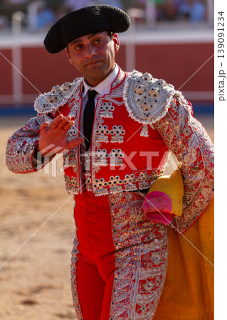 A bullfighter salutes the presidential box after the bullfight A bullfighter salutes the presidential box after the bullfight 139091234
