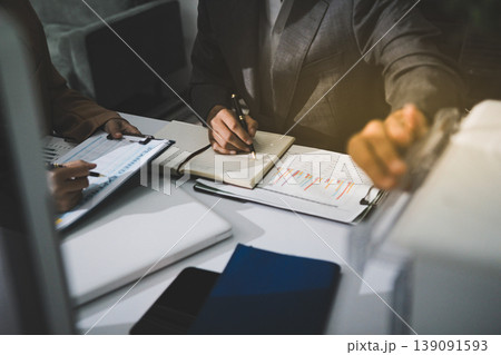 Accounting company provide finance and taxation planning for profitable cash flow, Auditor accountant working in office, analyze financial data and accounting record with calculator Accounting company provide finance and taxation planning for profitable cash flow, Auditor accountant working in office, analyze financial data and accounting record with calculator 139091593