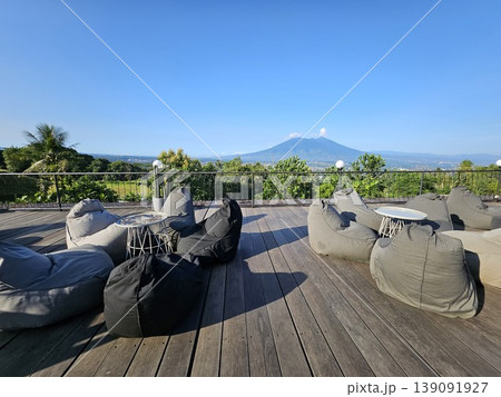 this is soft sofa with a mountain background this is soft sofa with a mountain background 139091927