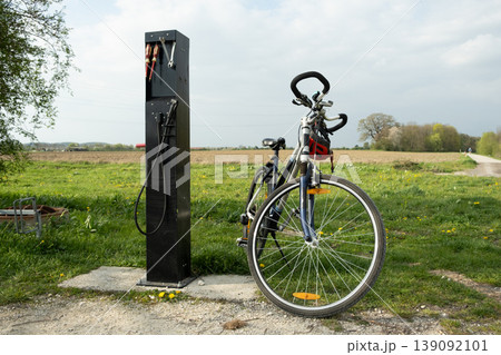 Outdoor bicycle service station with tools in rural areas 139092101