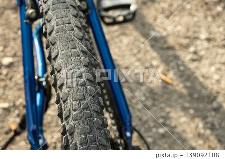 Close-up of old cracked bicycle tire tread. Close-up of old cracked bicycle tire tread. 139092108