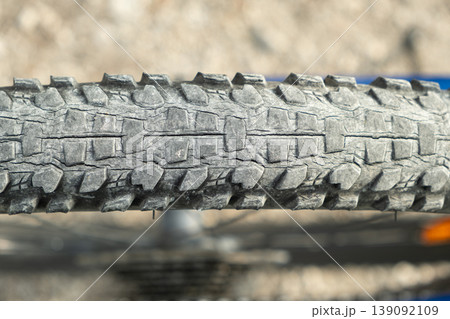 Detailed texture of damaged bicycle rubber tire. Detailed texture of damaged bicycle rubber tire. 139092109