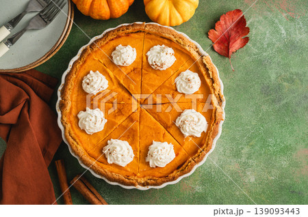 Pumpkin pie, Thanksgiving homemade crust tart, topped with whipped cream Pumpkin pie, Thanksgiving homemade crust tart, topped with whipped cream 139093443