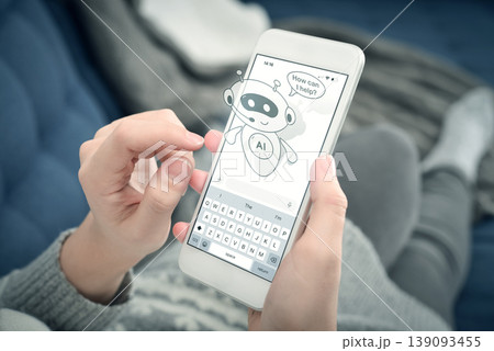 Cute AI assistant chatbot on smartphone screen, woman using mobile phone at home. Virtual support concept. 139093455