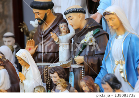 Catholic Religious items, figurines of saints in one of the Souvenir shop in Basilica Assumption of the Virgin Mary in Marija Bistrica, Croatia Catholic Religious items, figurines of saints in one of the Souvenir shop in Basilica Assumption of the Virgin Mary in Marija Bistrica, Croatia 139093738