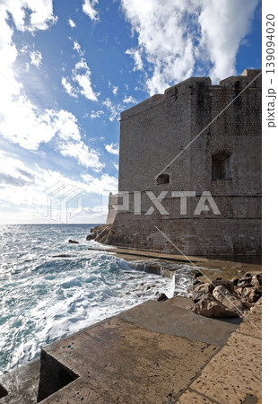 Defense walls of the old town of Dubrovnik, a well-preserved medieval fortress and a popular tourist destination, Croatia 139094020