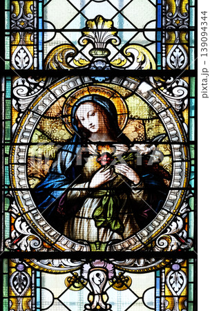 Immaculate heart of Mary, stained glass window in Cathedral of St Nicholas in Novo Mesto, Slovenia Immaculate heart of Mary, stained glass window in Cathedral of St Nicholas in Novo Mesto, Slovenia 139094344