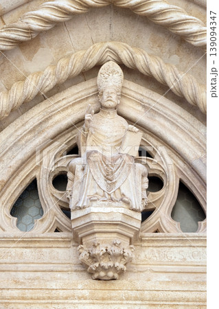 Statue of St. Mark the Evangelist on the St Mark s Church in the historic city Korcula at the island Korcula in Croatia Statue of St. Mark the Evangelist on the St Mark s Church in the historic city Korcula at the island Korcula in Croatia 139094347