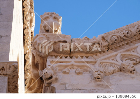 The sculpture, decoration on the St Mark s Church in the historic city Korcula at the island Korcula in Croatia The sculpture, decoration on the St Mark s Church in the historic city Korcula at the island Korcula in Croatia 139094350