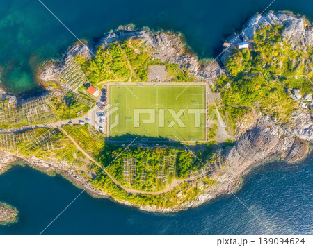 Aerial top down view of the famous Henningsvaer football stadium in Lofoten islands, Norway. 139094624