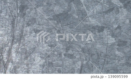 Gray scratched metal surface with worn industrial texture, abstract background featuring scuffs, stains and rough brushed pattern for design and construction themes. Gray scratched metal surface with worn industrial texture, abstract background featuring scuffs, stains and rough brushed pattern for design and construction themes. 139095599