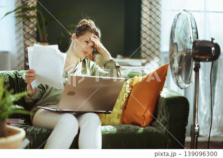 Overwhelmed Woman Battling Financial Stress at Home 139096300