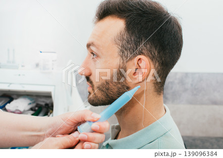 process of molded individual hearing aid earmolds. A man, having procedure making individual earmolds 139096384