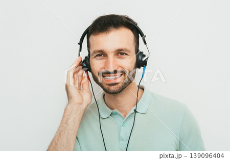 Hearing test, hearing diagnostic. A man wearing headphones having an audiometry . Hearing check-up Hearing test, hearing diagnostic. A man wearing headphones having an audiometry . Hearing check-up 139096404