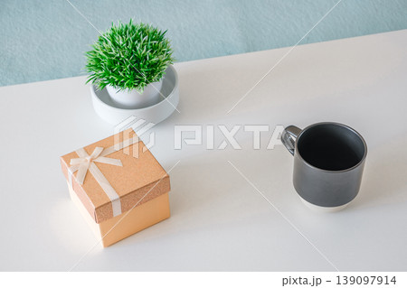 decorative flower gift box and mug on the table decorative flower gift box and mug on the table 139097914