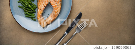 Healthy baked salmon with vegetables banner Healthy baked salmon with vegetables banner 139099062