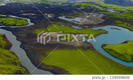 Aerial View of Iceland's Moss Covered Terrain and Winding River Aerial View of Iceland's Moss Covered Terrain and Winding River 139099600