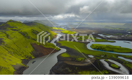 Aerial View of Iceland's Volcanic Landscape with Rivers and Rainbow 139099618