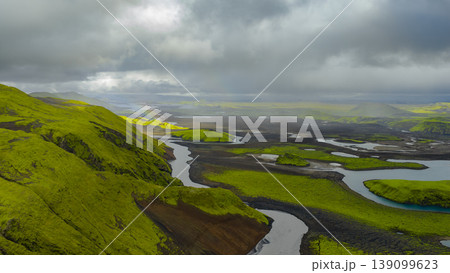Aerial View of Iceland's Volcanic Landscape with Rivers and Rainbow 139099623