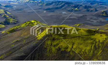 Aerial View of Iceland's Volcanic Landscape with Moss Covered Hills Aerial View of Iceland's Volcanic Landscape with Moss Covered Hills 139099636